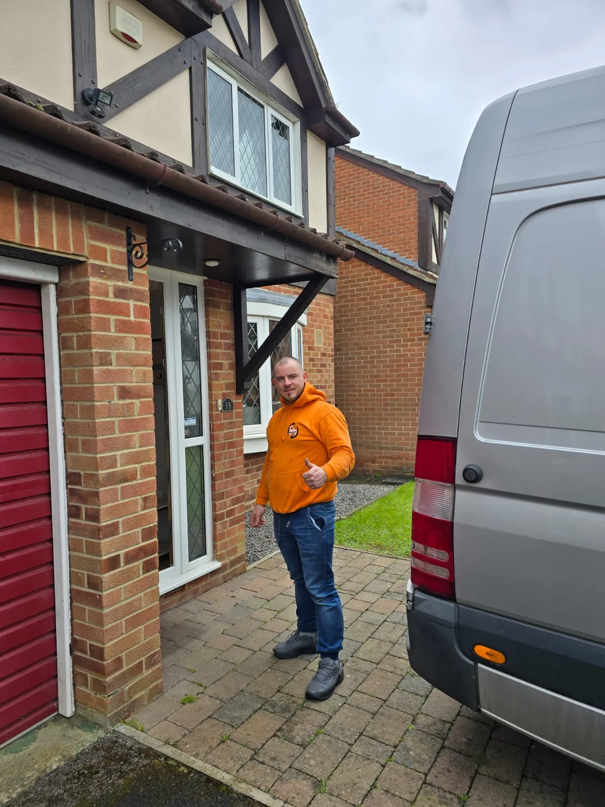 All Around Removals mover outside a customer's house