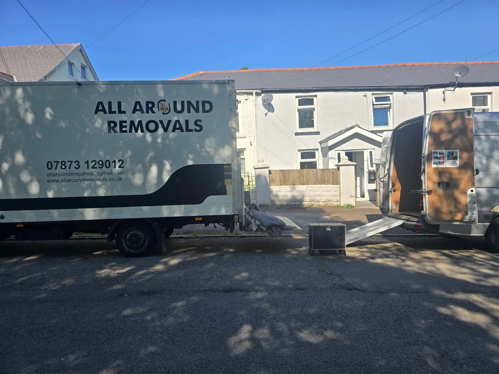 All Around Removals van and trailer parked on a residential street