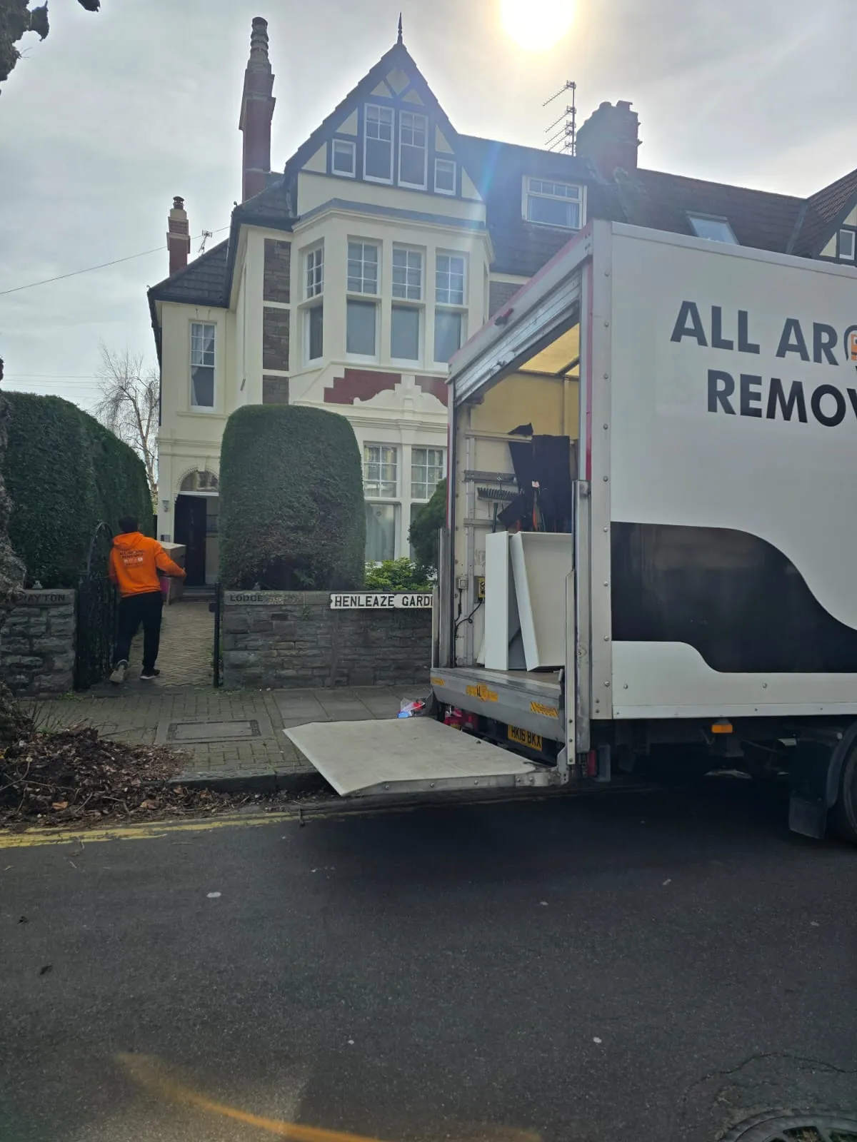 All Around Removals van loading outside a large Victorian house